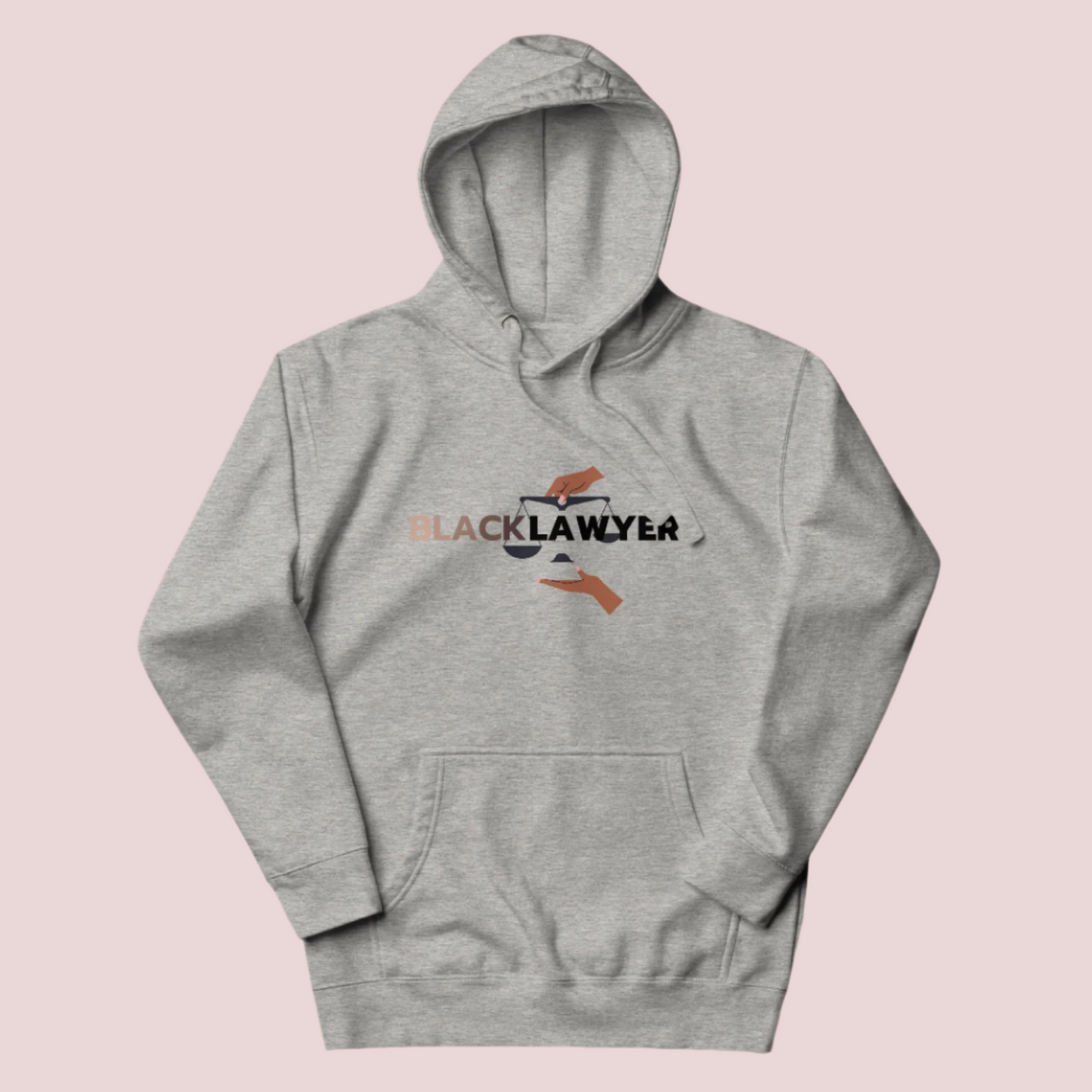 A heather grey hoodie with the words "Black Lawyer" on it and a woman's hand holding an imbalanced justice scale.
