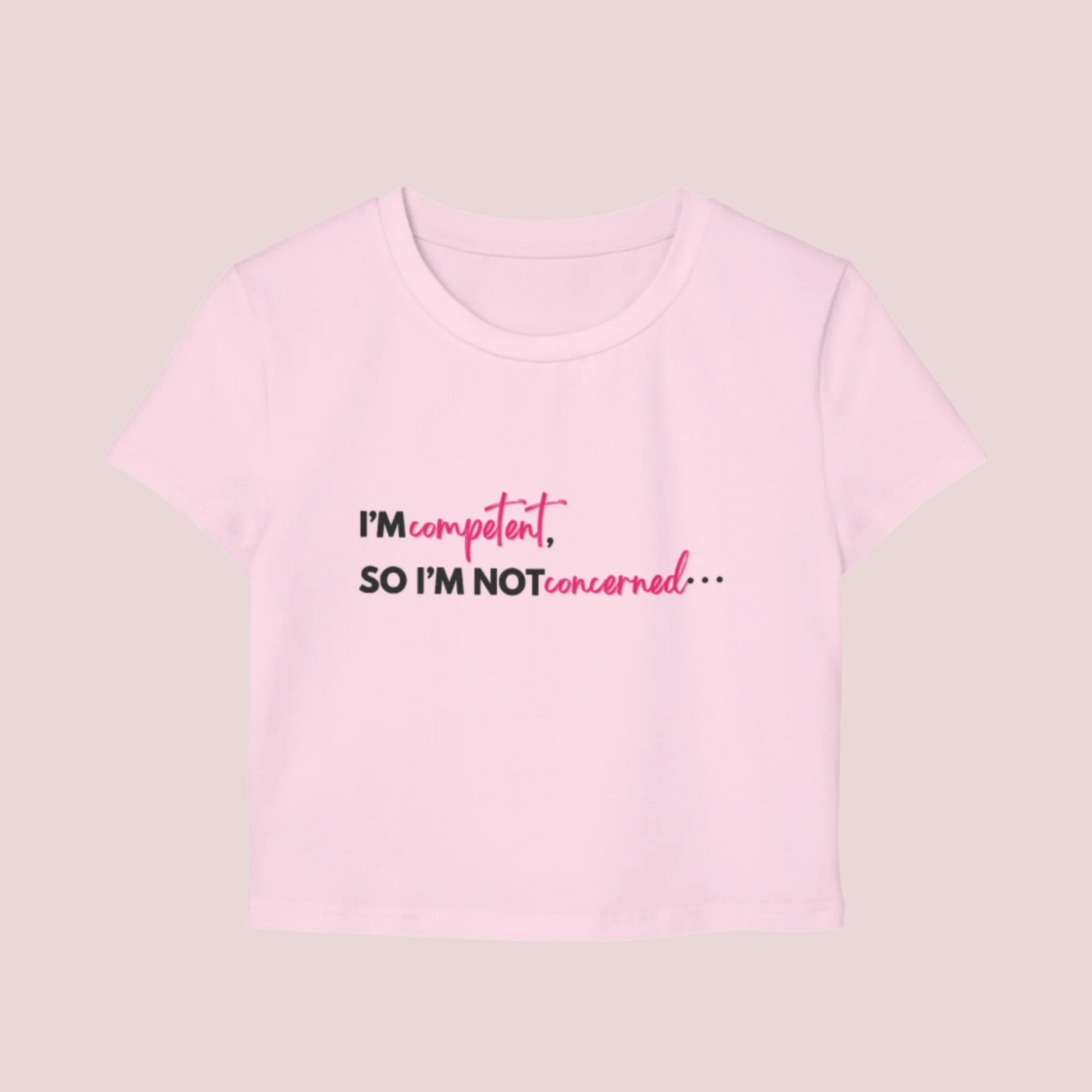 A pink roundneck cropped tee with the slogan "I'm competent, so I'm not concerned".