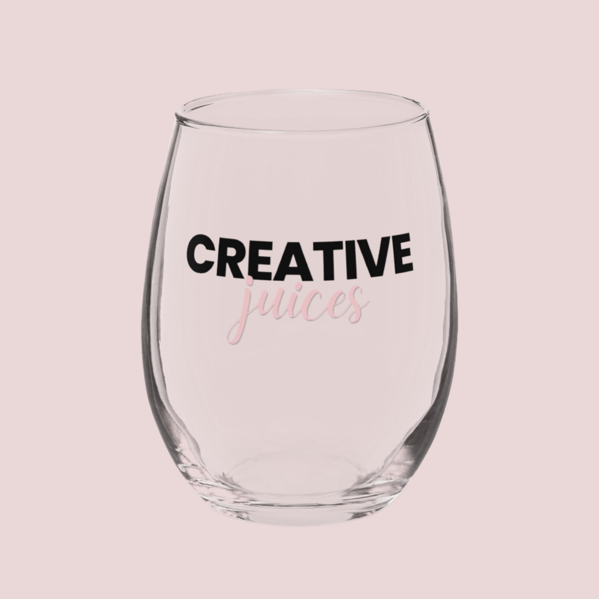 A stemless wine glass with the text "creative juices" on the front.