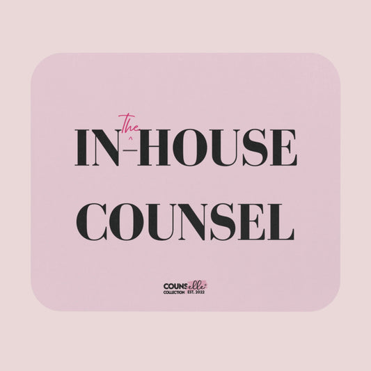 A rectangular, pink mousepad showing the text "IN", "^", "the", "-HOUSE", and COUNSEL", with the counsellecollection logo at the bottom of the design.