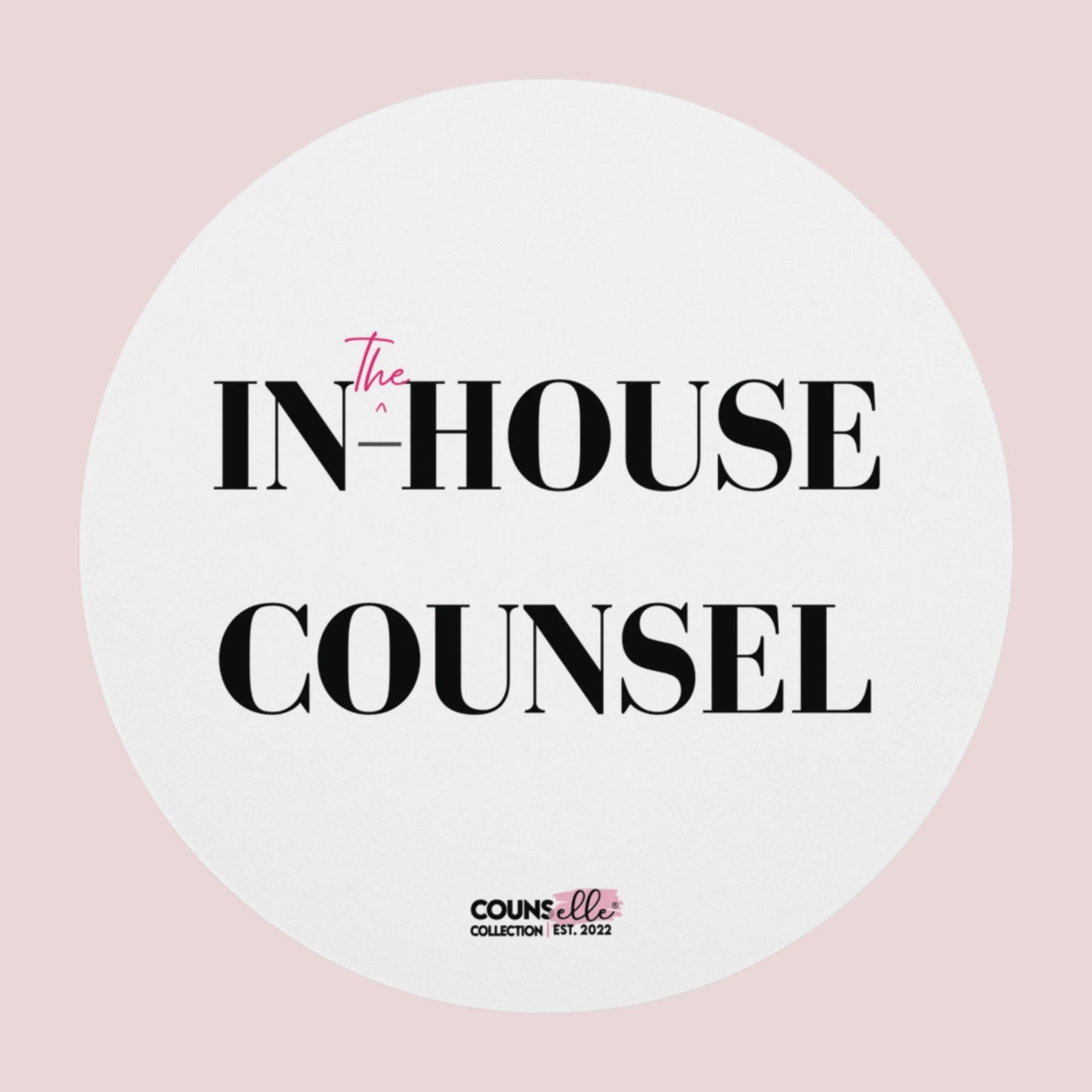 A round white mouse pad showing the text "IN", "^", "the", "-HOUSE", and COUNSEL", with the counsellecollection logo at the bottom of the design.