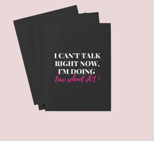 A black folder / report cover with the phrase "I can’t talk right now, I’m doing Law school sh*t" on the cover and the counseled collection logo at the back. Also available in pink.