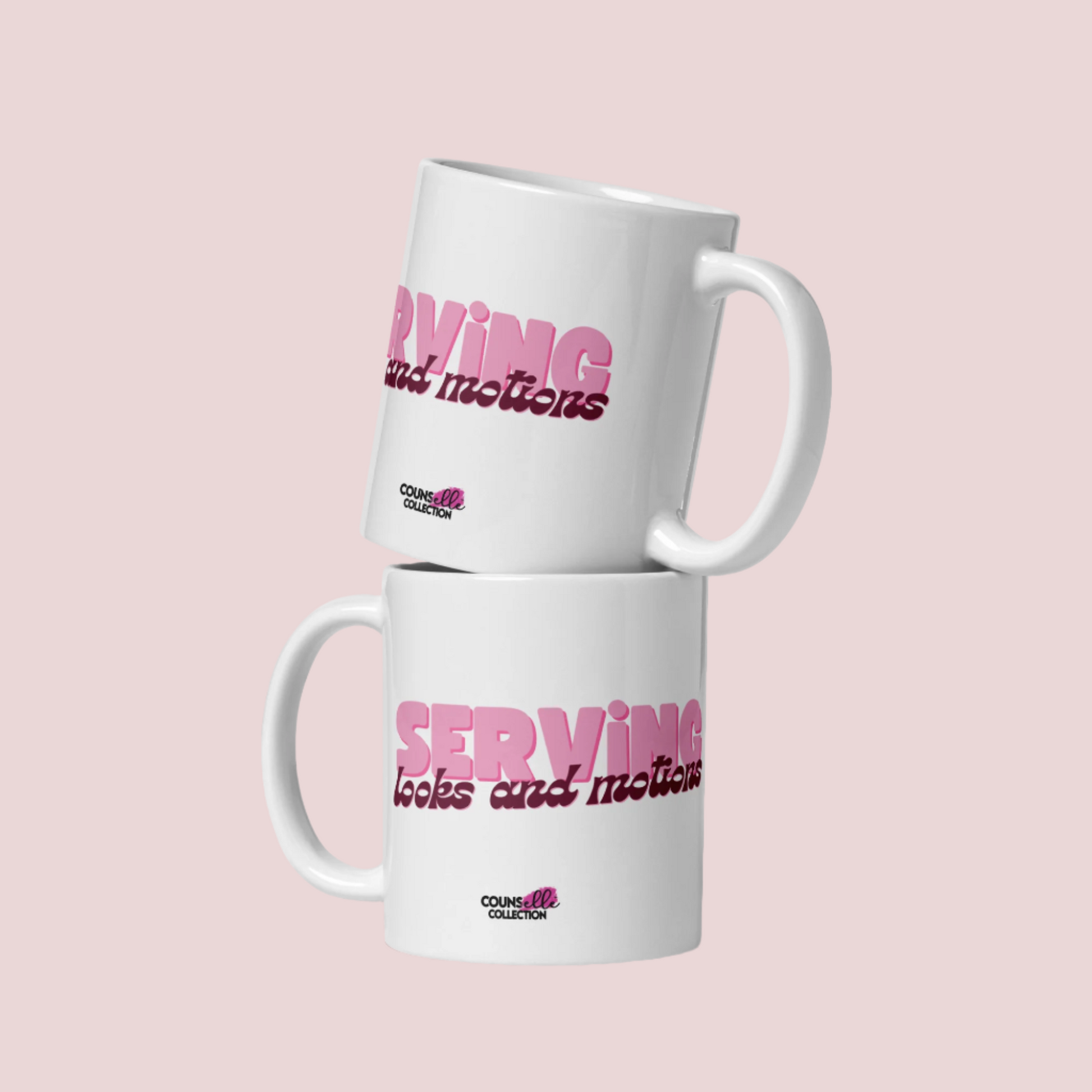 Two white, 11oz mugs, stacked on top of one another, featuring the words "serving looks and motions" in pink and burgundy letters.