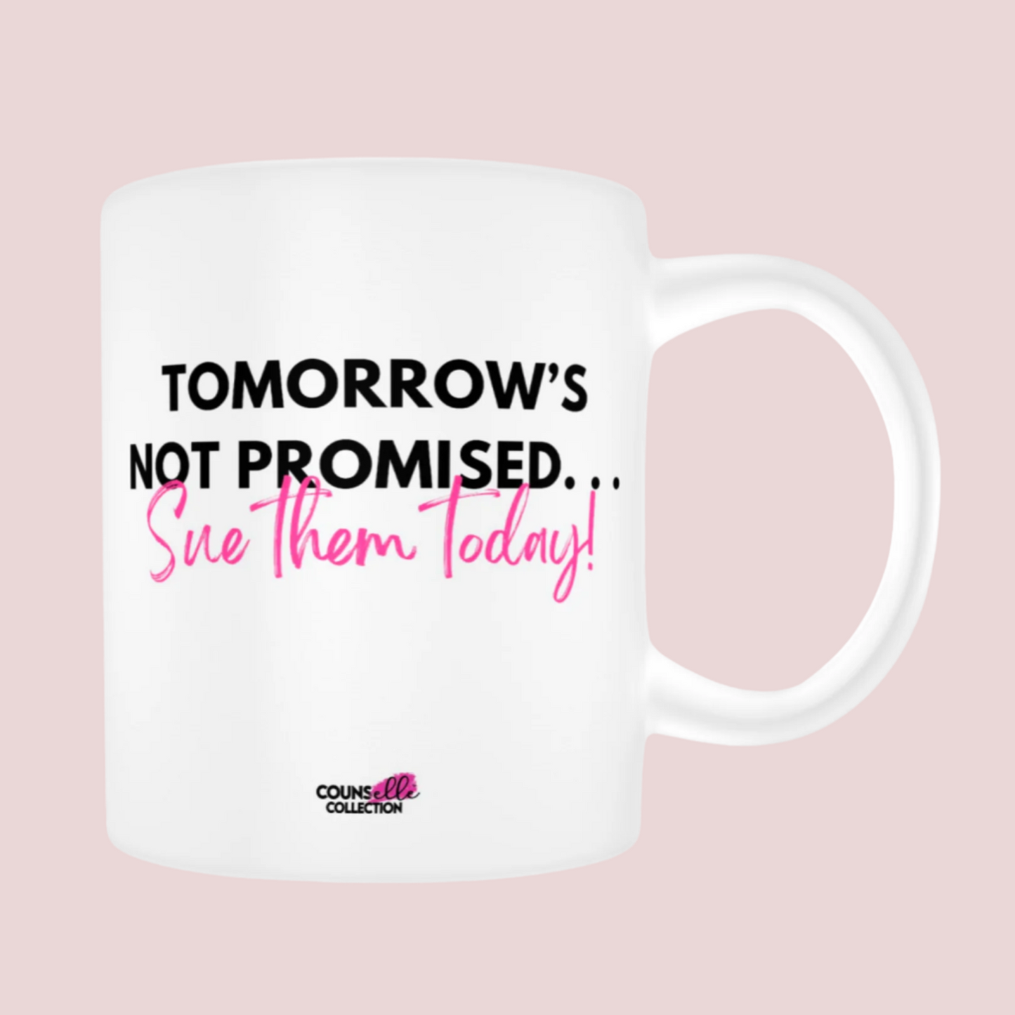 A ceramic mug featuring the words "TOMORROW'S NOT PROMISED" in black bold text and the words "Sue them Today" in pink Script Font