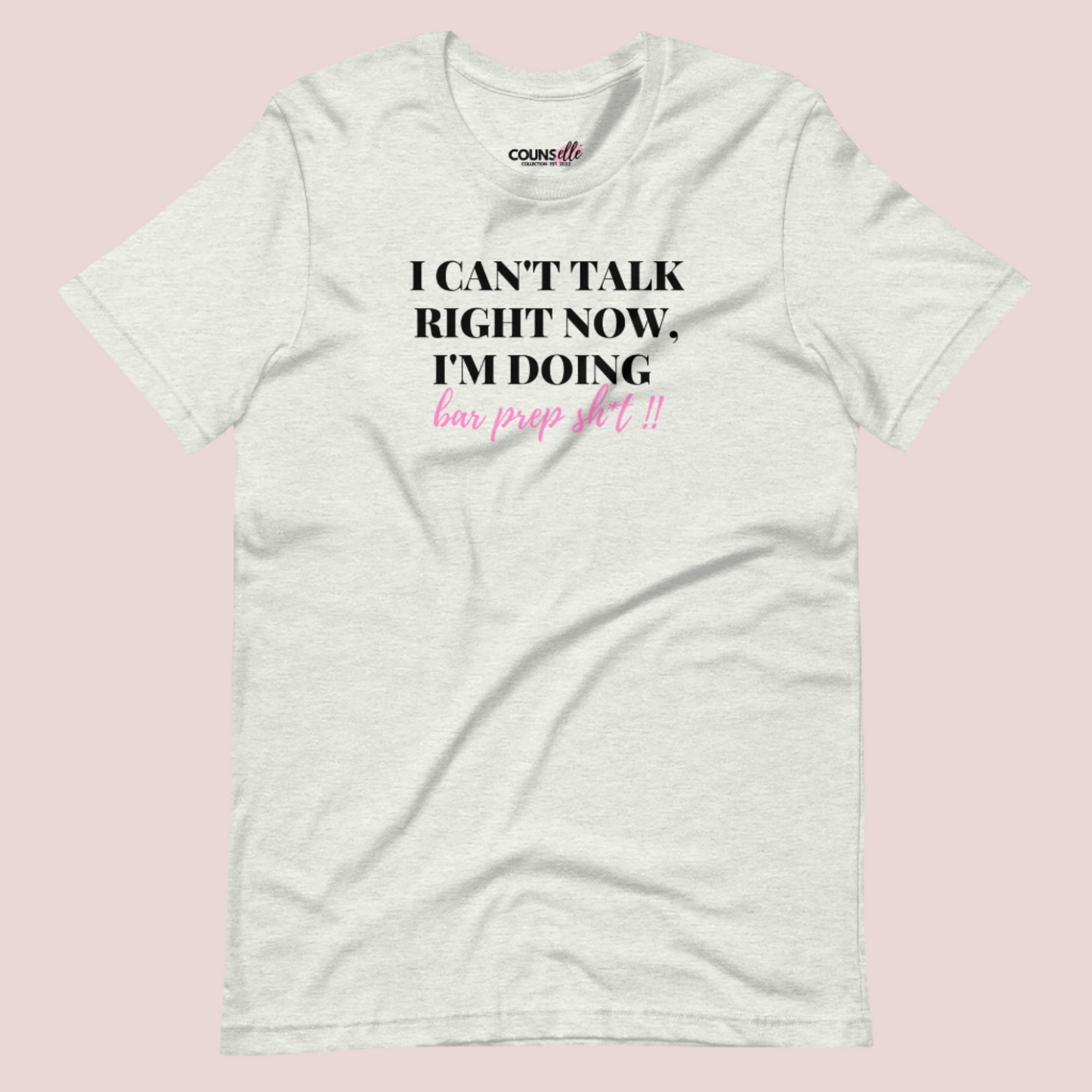 An ash grey roundneck tee showing the text "I CAN'T TALK RIGHT NOW, I'M DOING BAR PREP SH*T!"