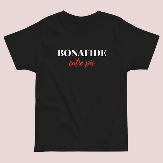 A black roundneck tee featuring the word "BONAFIDE" in white uppercase font and "cutie pie" in red script font.