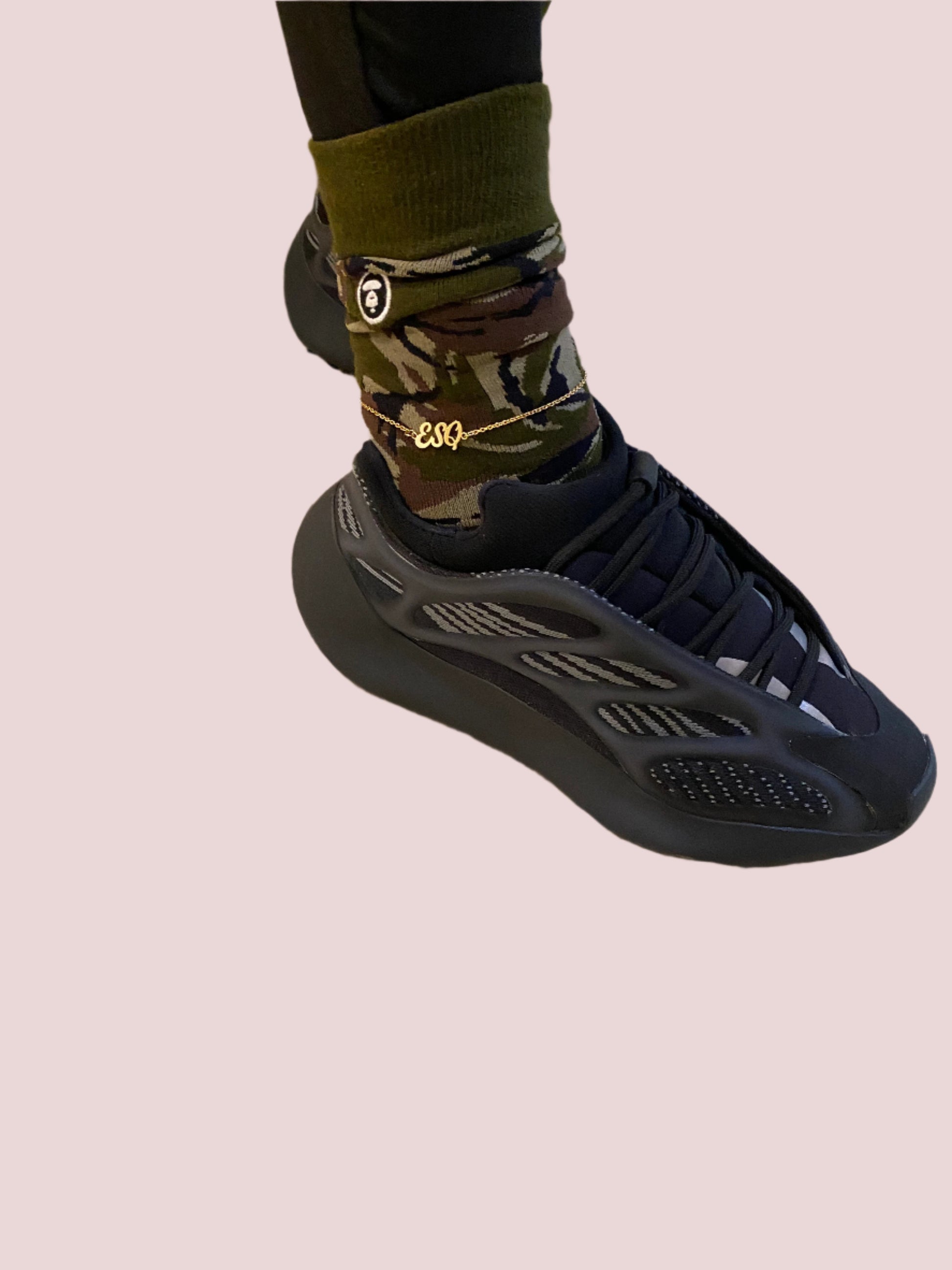 The “Call Me Esquire” Anklet features the letters "ESQ" in an elegant script font as a charm on a delicate chain. Available in Gold, Rose Gold, and Silver.