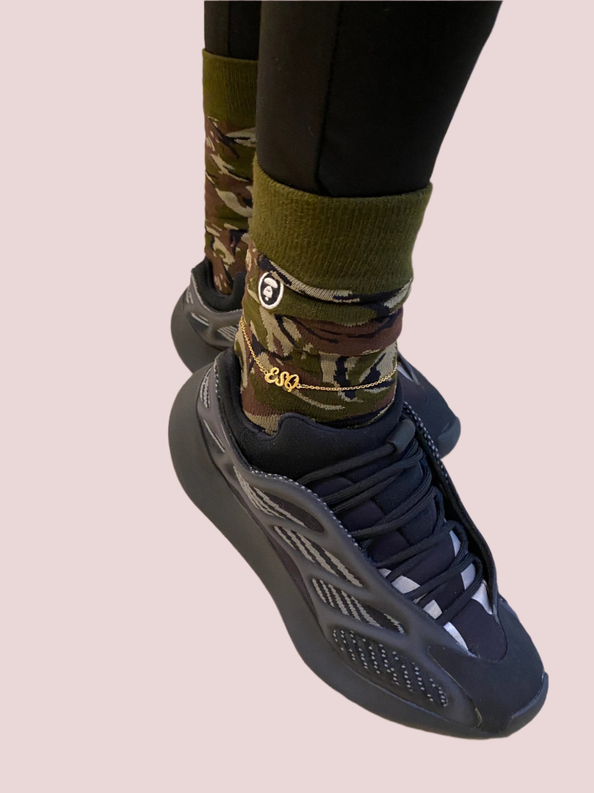 The “Call Me Esquire” Anklet features the letters "ESQ" in an elegant script font as a charm on a delicate chain. Available in Gold, Rose Gold, and Silver.