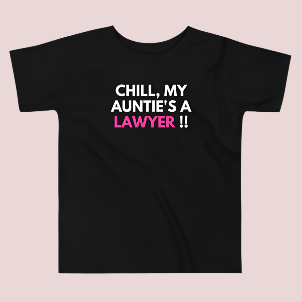 A black roundneck kid's tee featuring the quote "Chill, my auntie's a lawyer" in uppercase text.