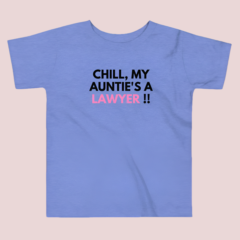 A blue roundneck kid's tee featuring the quote "Chill, my auntie's a lawyer" in uppercase text.