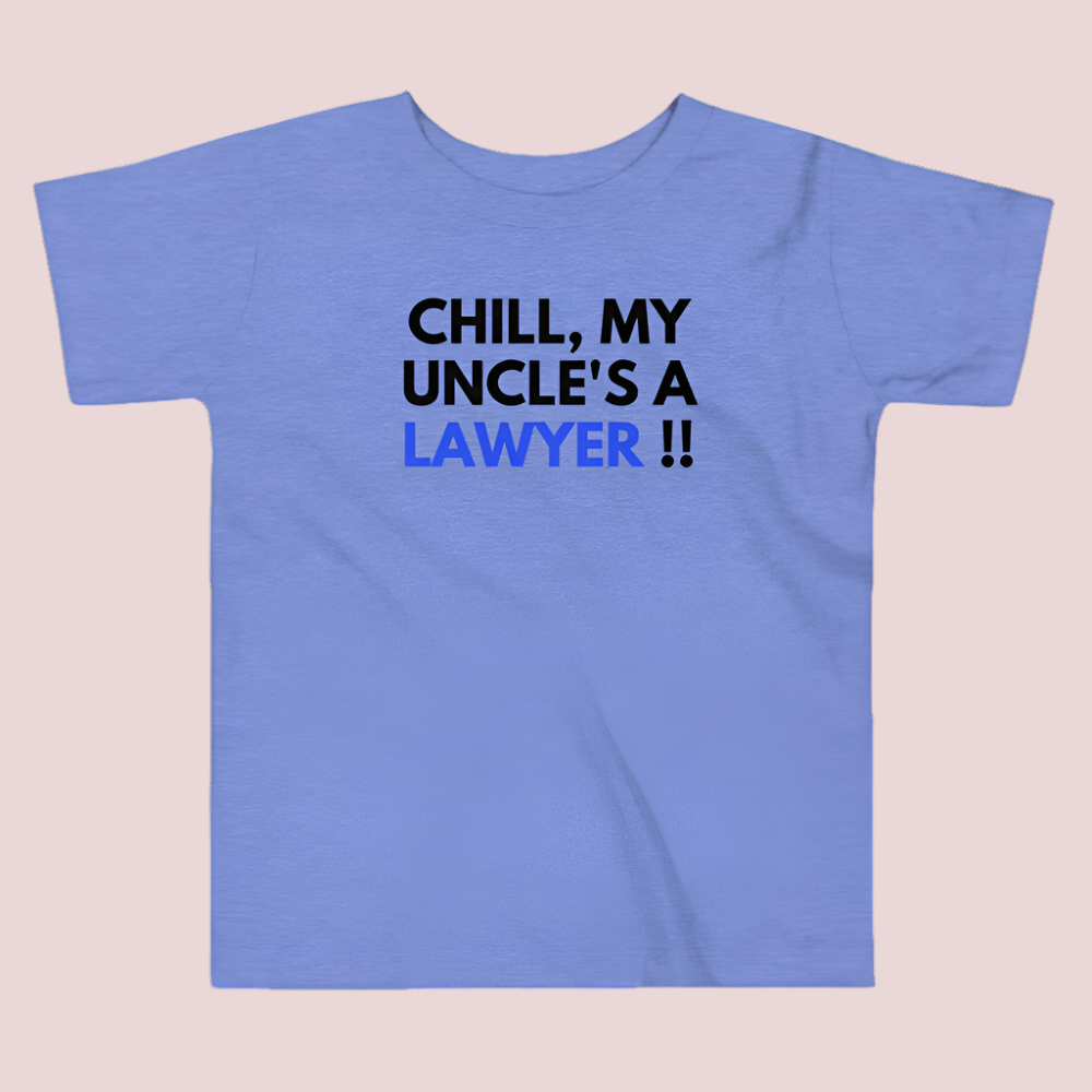 A blue roundneck kid's tee featuring the quote "Chill, my uncle's a lawyer" in uppercase text.