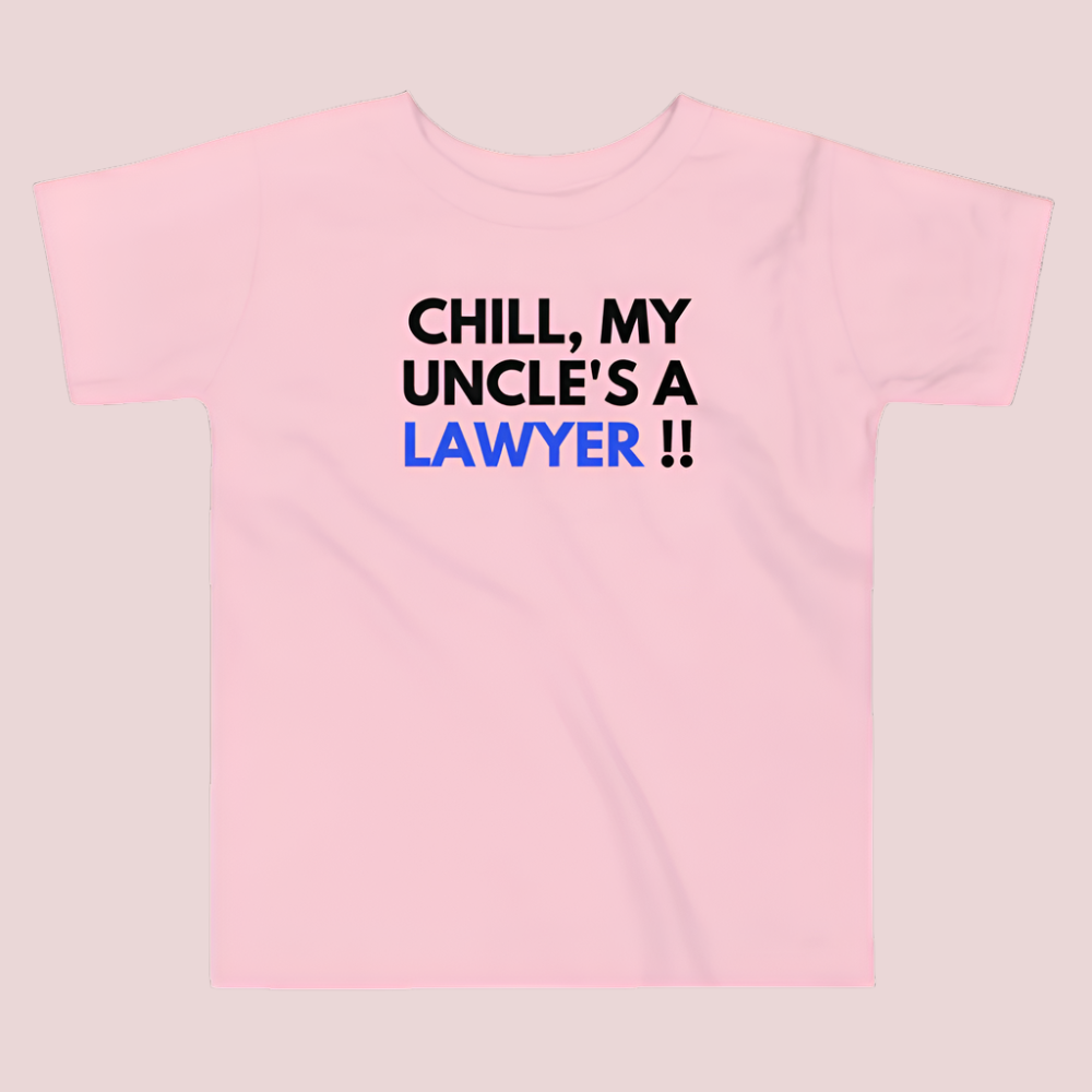 A pink roundneck kid's tee featuring the quote "Chill, my uncle's a lawyer" in uppercase text.