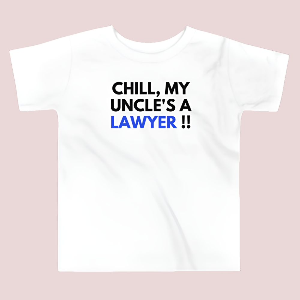 A white roundneck kid's tee featuring the quote "Chill, my uncle's a lawyer" in uppercase text.