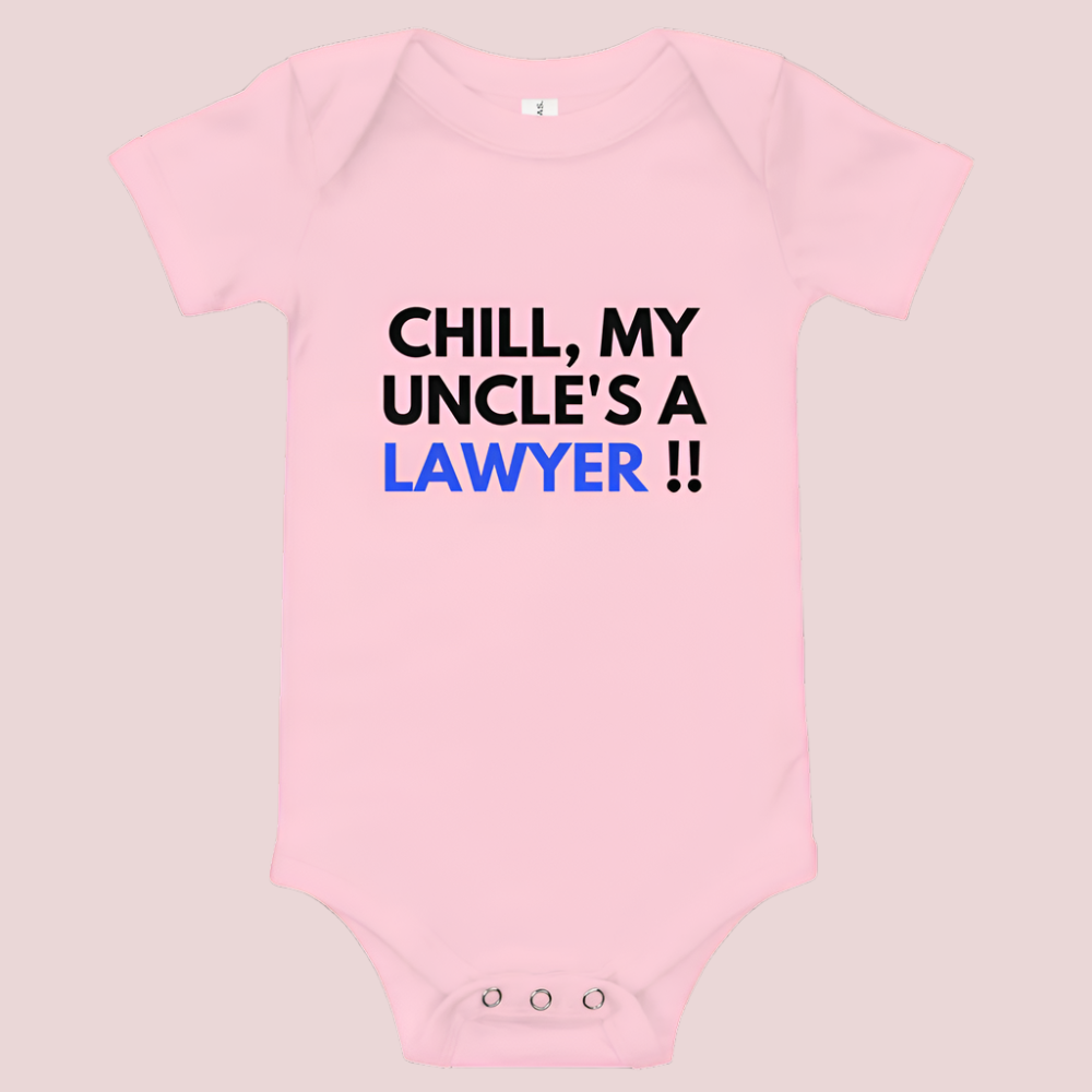 A pink baby onesie with a three-snap leg closure featuring the quote "Chill my uncle's a lawyer" in uppercase block text.