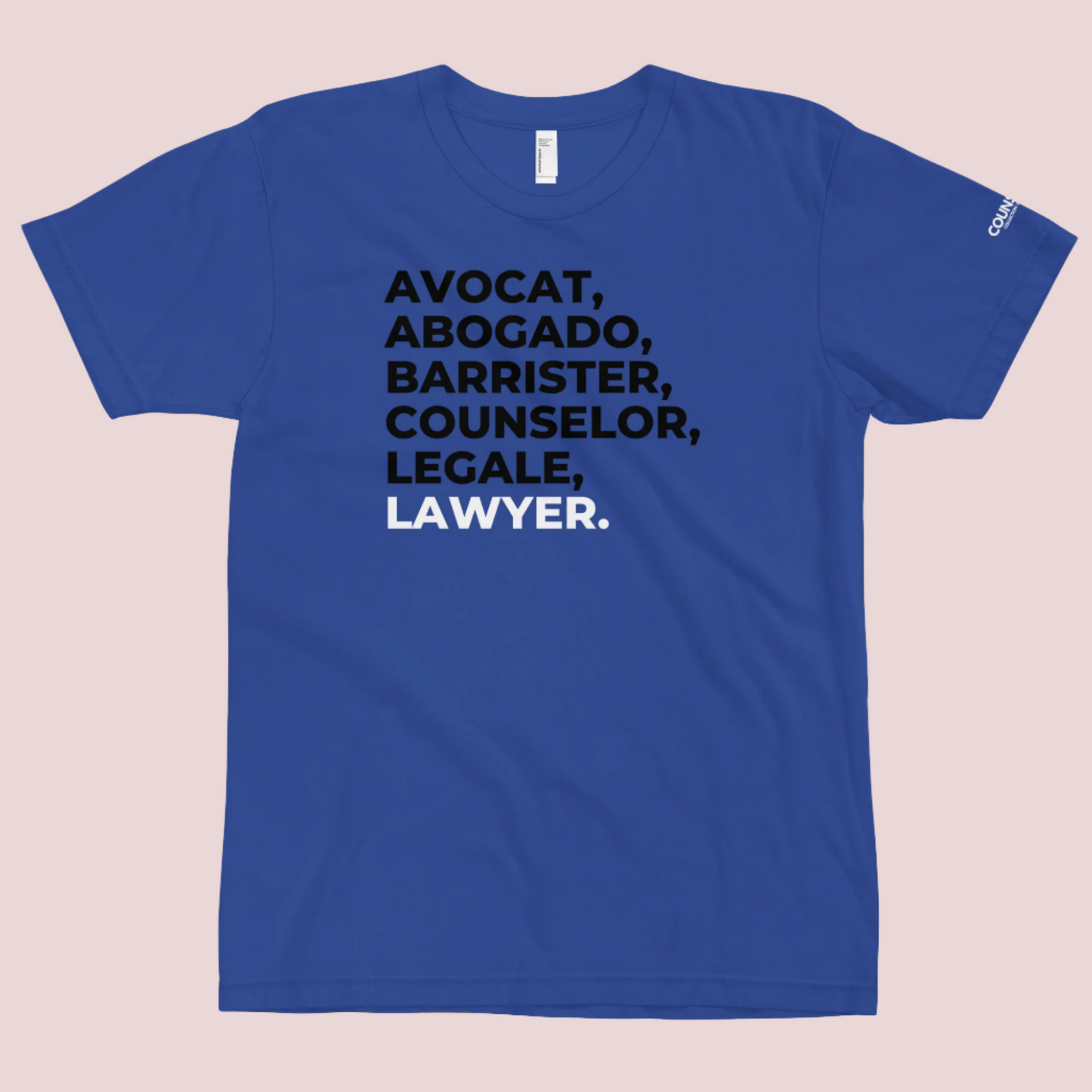 A cerulean blue, short sleeved tee with the word "LAWYER" translated into multiple languages.