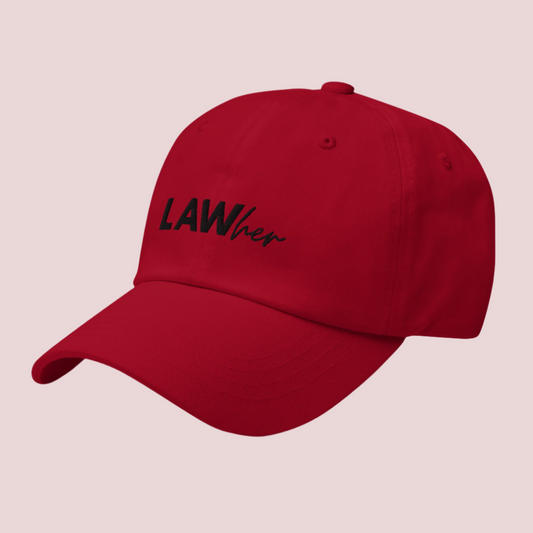 A red baseball hat featuring the text "LAWher" in black font.