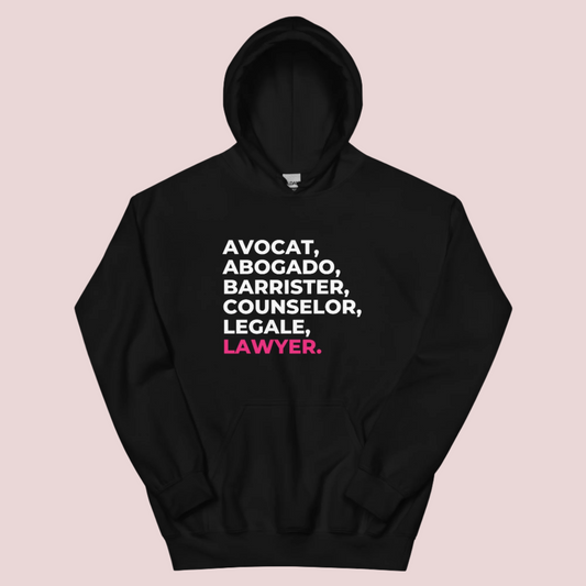 A black hoodie with the words "AVOCAT", "ABOGADO", "BARRISTER", "COUNSELOR", "LEGALE", and "LAWYER".