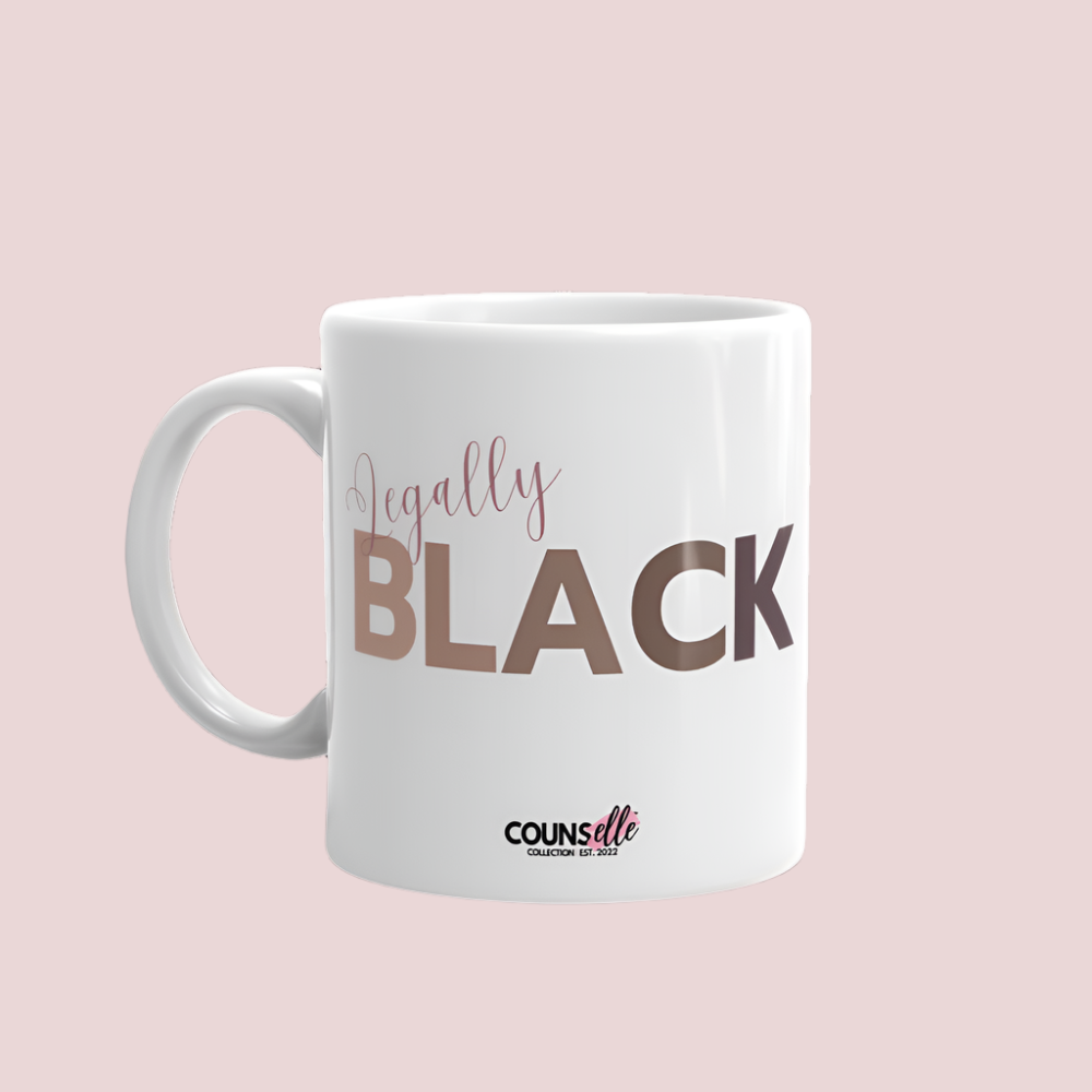 A white ceramic mug featuring the word "LEGALLY" in script font and the word "BLACK" in bold text with the counsellecollection logo at the bottom of the design.