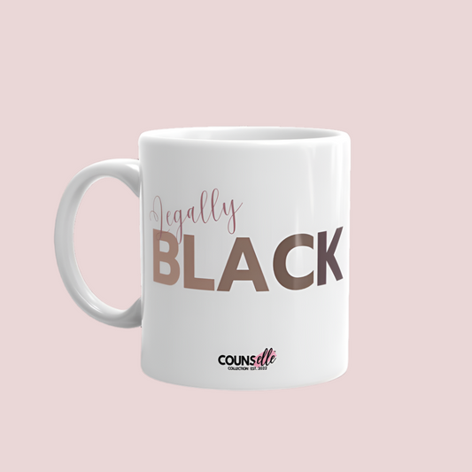 A white ceramic mug featuring the word "LEGALLY" in script font and the word "BLACK" in bold text with the counsellecollection logo at the bottom of the design.