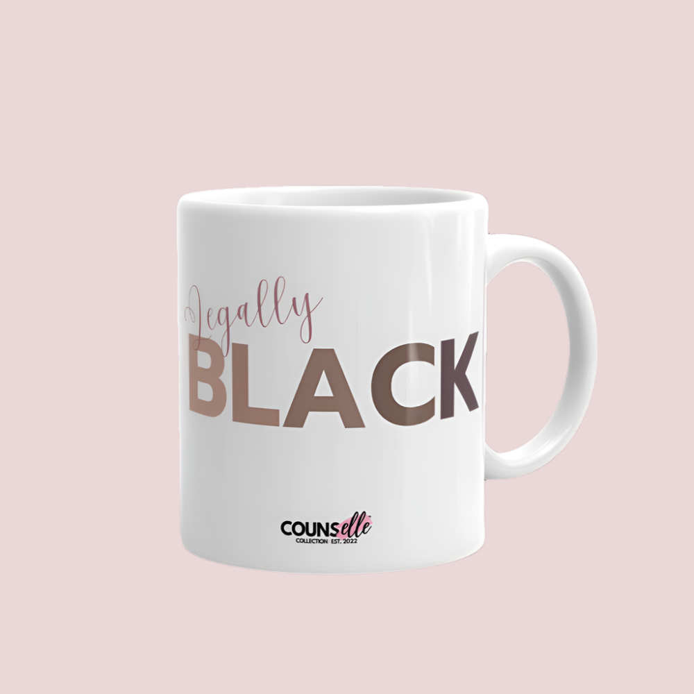 A white ceramic mug featuring the word "LEGALLY" in script font and the word "BLACK" in bold text with the counsellecollection logo at the bottom of the design.