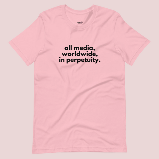 A pink roundneck tee showing the text "all media, worldwide, in perpetuity."