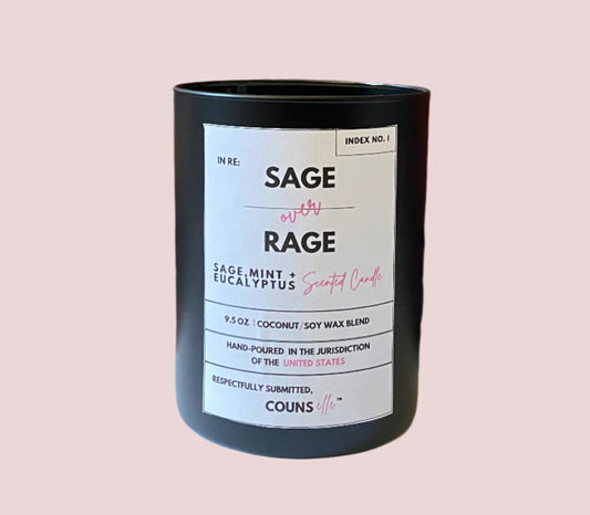 A candle in a black container with a white label featuring the text "INDEX NO. I", "IN RE:", "SAGE OVER RAGE", " SAGE MINT + EUCALYPTUS SCENTED CANDLE", "9.5 oz", "COCONUT/SOY WAX BLEND", "HAND-POURED IN THE JURISDICTION OF THE UNITED STATES", "RESPECTFULLY SUBMITTED", with the counsellecollection logo at the bottom of the design.