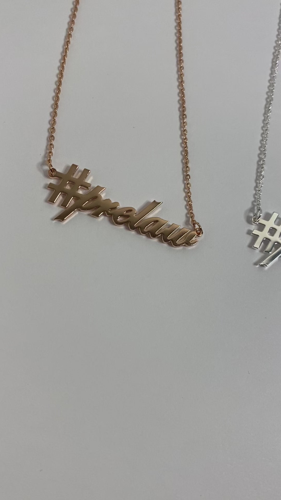 The "#prelaw" Necklaces in gold and silver product video