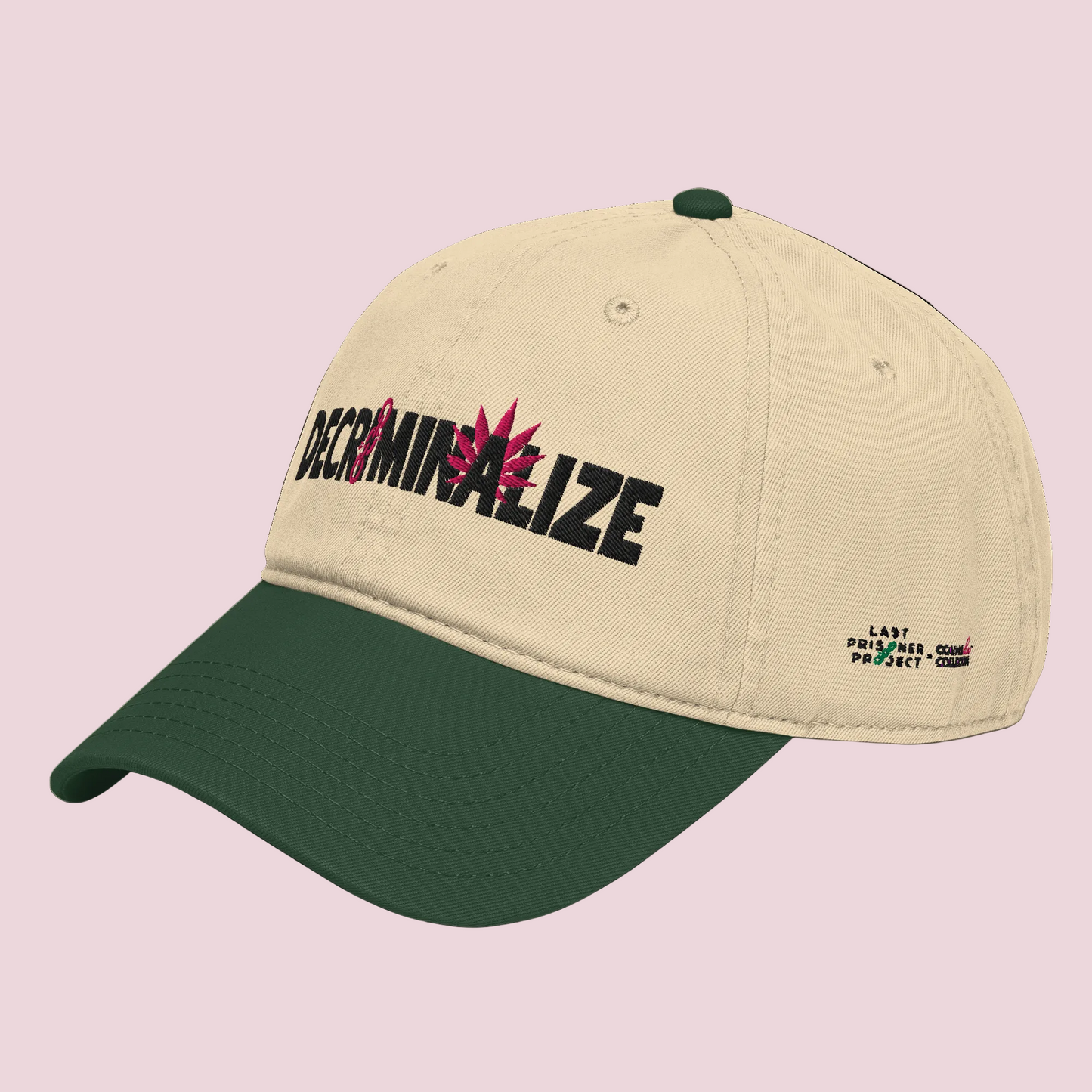 Beige and green cap with 'DECRIMINALIZE' text and cannabis leaf design on front of cap. last prisoner project x counselle collection® logos on side. 