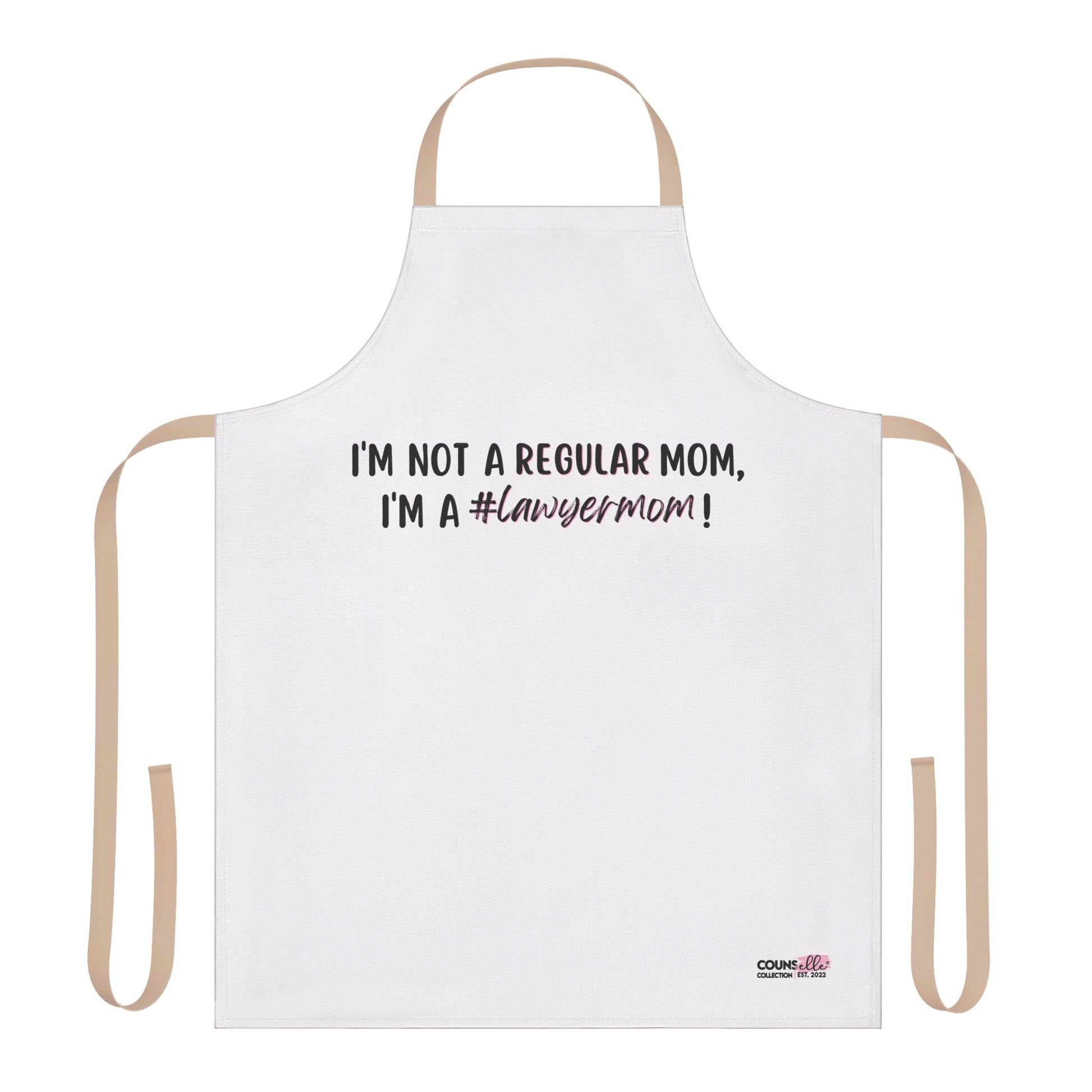 A white apron with the text "I'm not a regular mom, I'm a #lawyermom! - "The "Lawyer Mom" Apron by THE COUNSELLE COLLECTION™