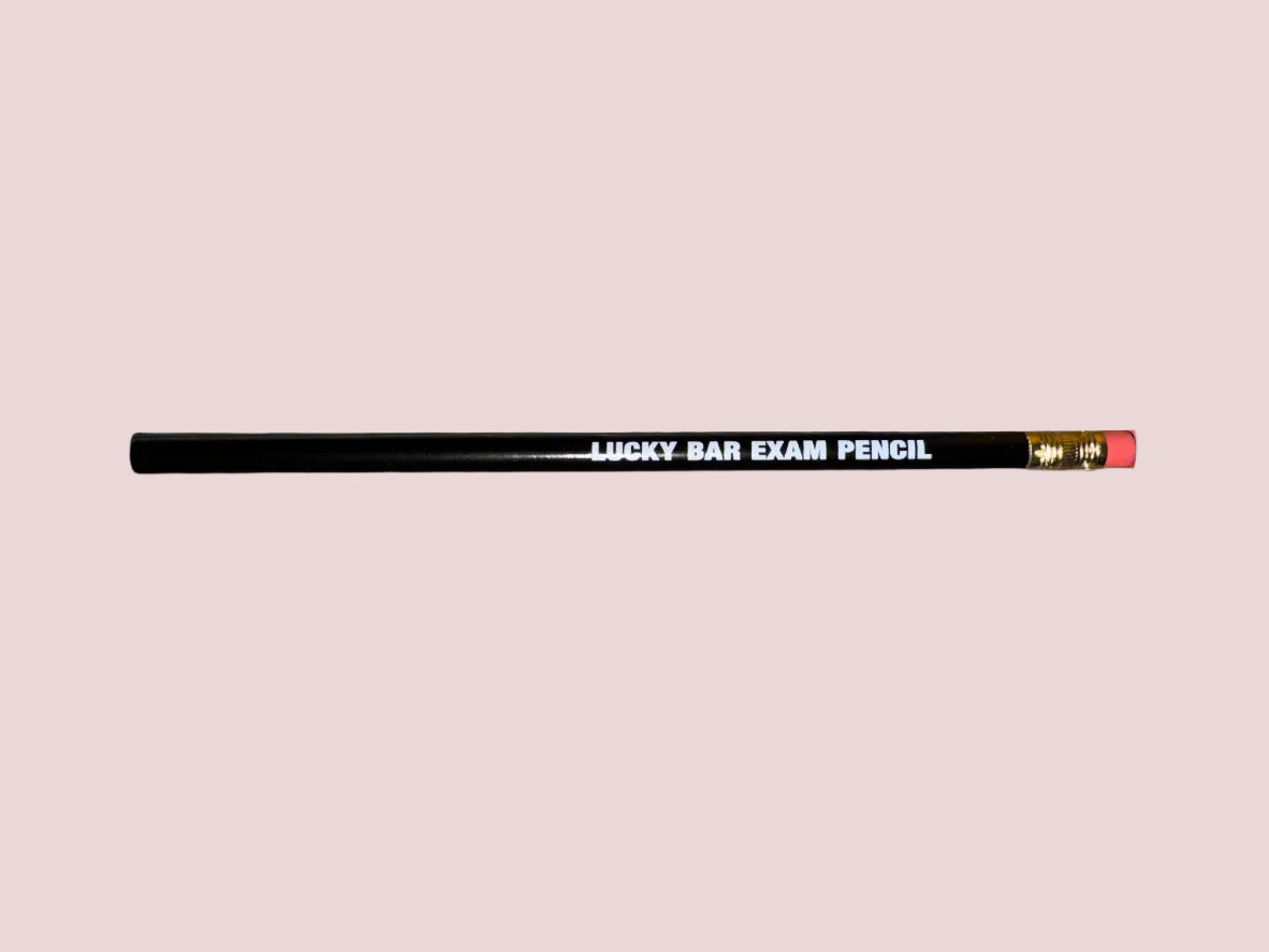 A black pencil with the words "LUCKY BAR EXAM PENCIL" written in uppercase white font