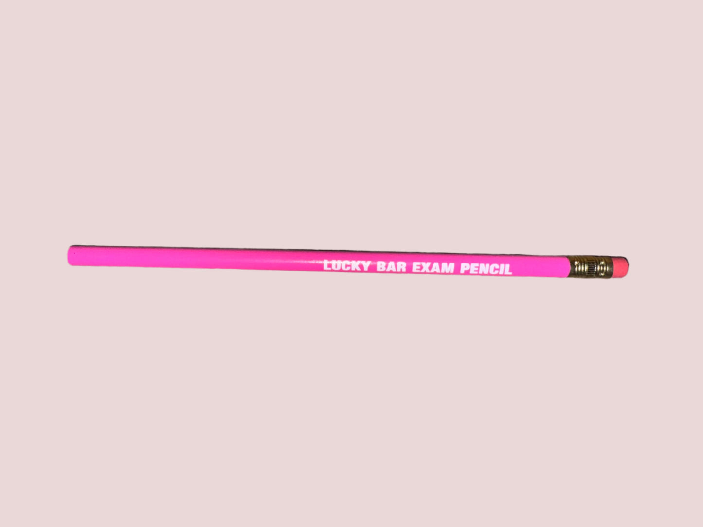 A pink pencil with the words "LUCKY BAR EXAM PENCIL" written in uppercase white font