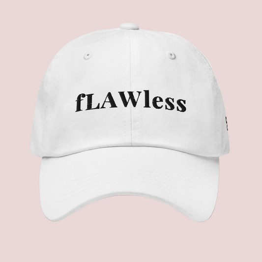 A white cap featuring the word "fLAWless" in black font