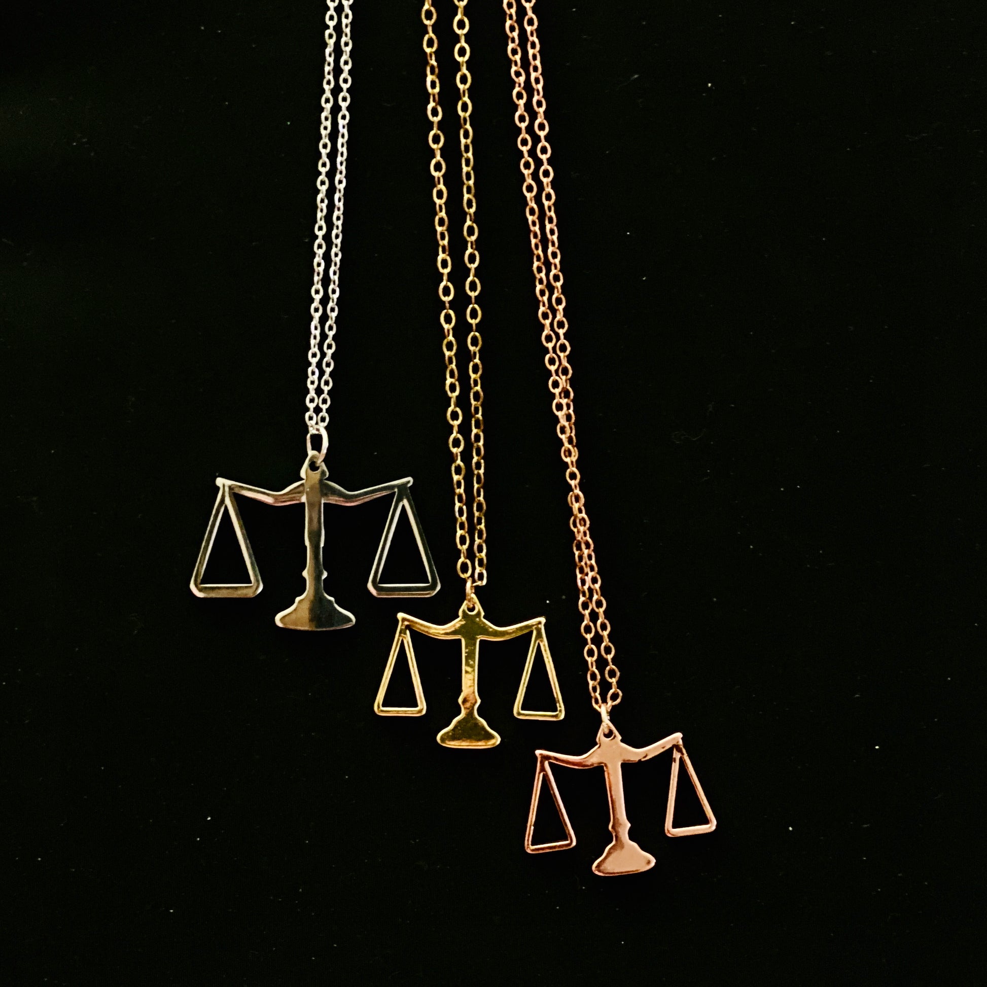 Tip The Scales Justice Scales Necklace by THE COUNSELLE COLLECTION - Stainless steel necklace with 18k gold plating, featuring justice scales.