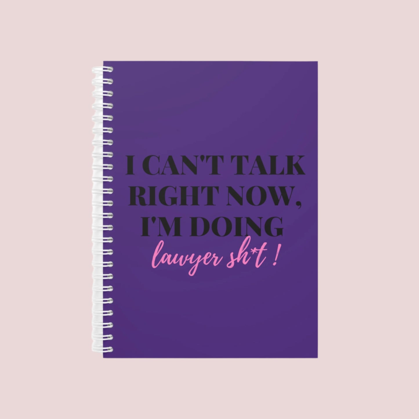 Notebook with the phrase "I can’t talk right now, I’m doing Lawyer girl sh*t" on the cover. Ring-bound with ruled pages for easy note-taking. Available in Black, Pinky, White, Grape, and Mellow Yellow, in both hardcover and softcover. Comes in two sizes: Small (5.5 x 8.5) and Large (8.5 x 11).