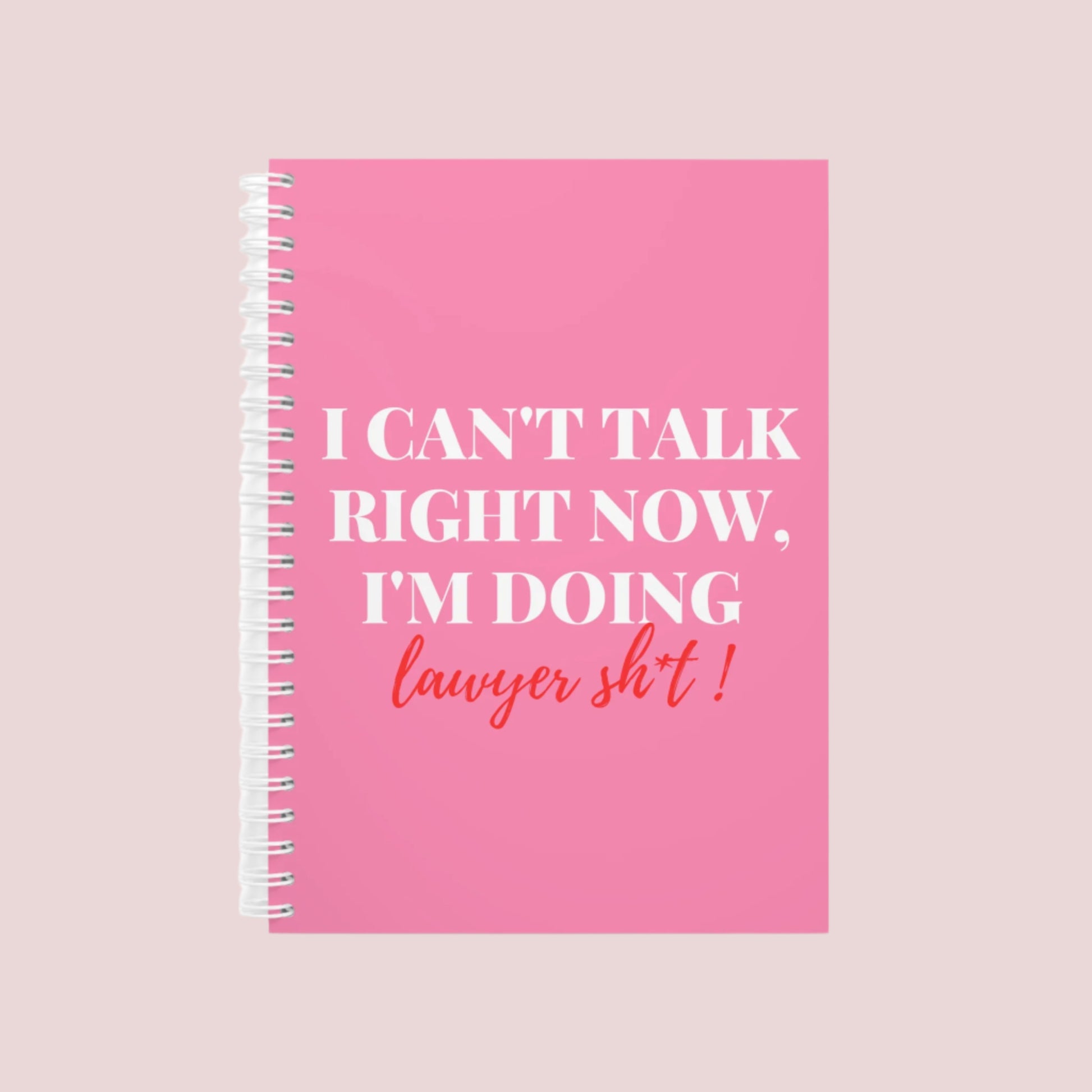 Notebook with the phrase "I can’t talk right now, I’m doing Lawyer girl sh*t" on the cover. Ring-bound with ruled pages for easy note-taking. Available in Black, Pinky, White, Grape, and Mellow Yellow, in both hardcover and softcover. Comes in two sizes: Small (5.5 x 8.5) and Large (8.5 x 11).