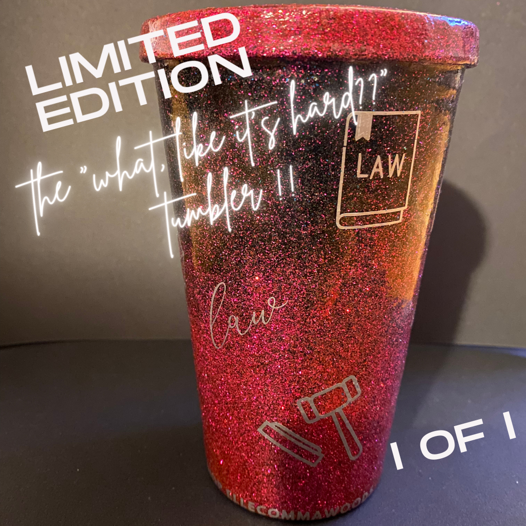 A glittery tumbler with a lid, featuring illustrations of a law book, a gavel, and the word "law" in script font on the sides of the tumbler.